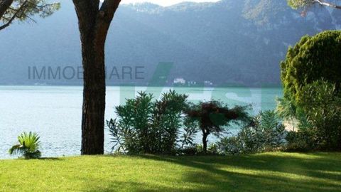 Elegant lake-front apartment with private garden and swimming pool